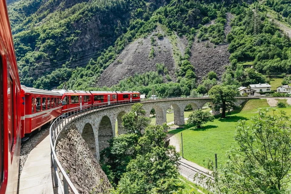 Bernina Express crossing an alpine viaduct